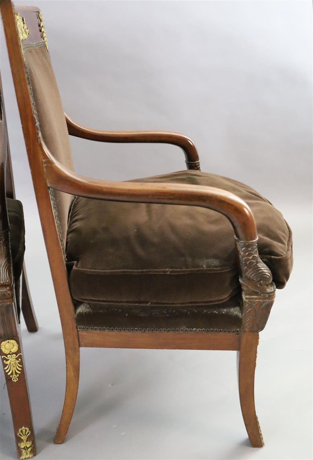 A pair of 19th century French Empire style ormolu mounted mahogany fauteuils, W.1ft 11in. D.1ft 8in. H.3ft